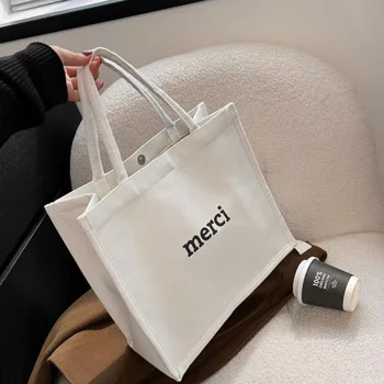 2023 Дамски холщовая чанта през рамо с надпис, висококачествена ежедневна чанта-тоут, по-голямата голям луксозен дизайнерски плажната чанта за пазаруване